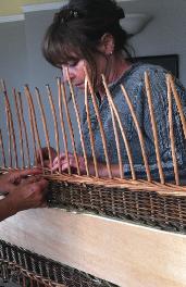 Weaving a willow coffin