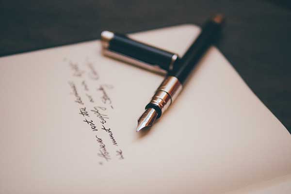 Image of pen and paper